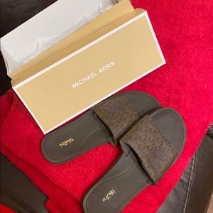 Michael Kors slides.